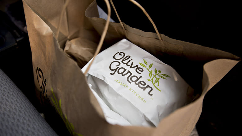 A bag of takeout from Olive Garden