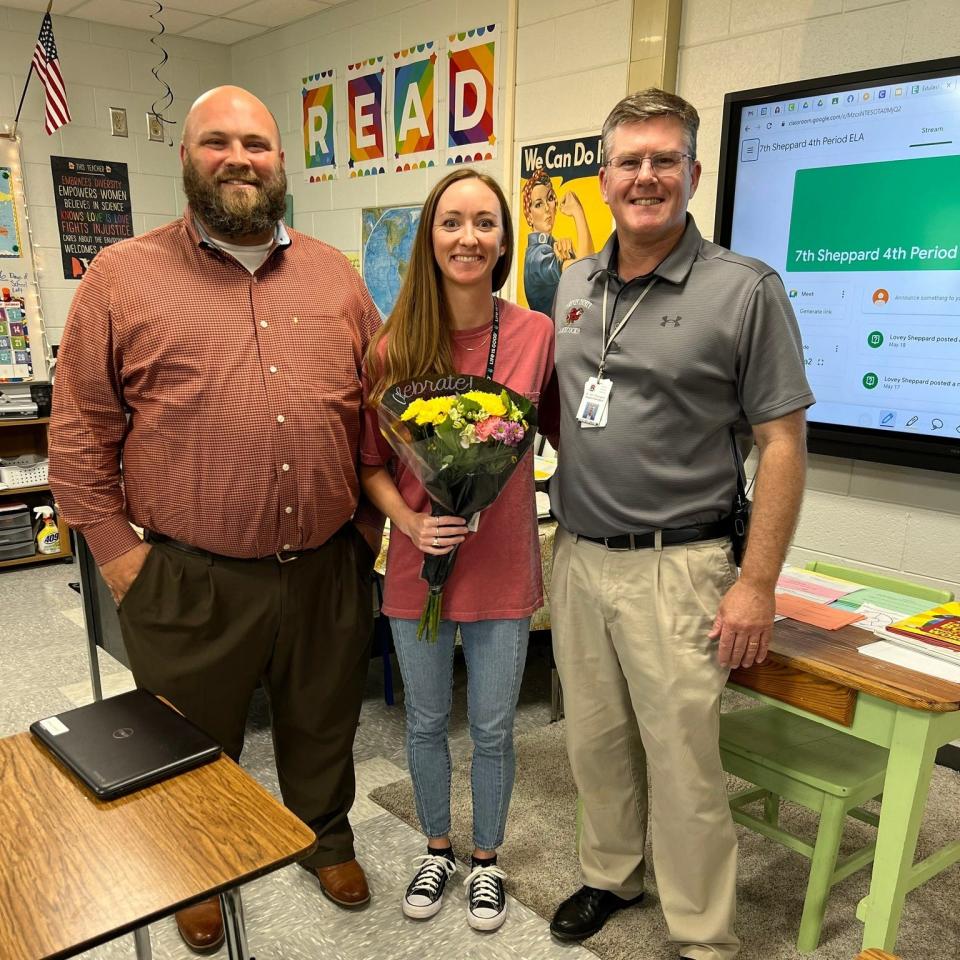 Screven County Middle School teacher Lovey Sheppard, center, was honored as the school's 2022-2023 Teacher of the Year by Principal Caleb White, left, and Superintendent Jim Thompson.