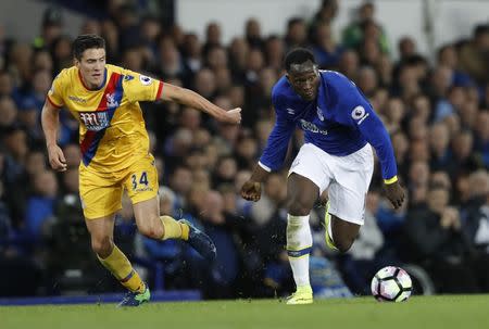 Britain Football Soccer - Everton v Crystal Palace - Premier League - Goodison Park - 30/9/16 Everton's Romelu Lukaku in action with Crystal Palace's Martin Kelly Action Images via Reuters / Carl Recine