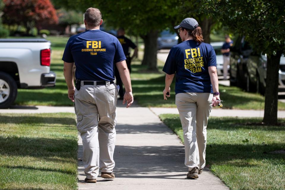 FBI agents leave UAW president Gary Jones' home in Canton after evidence is collected, Wednesday, August 28, 2019.