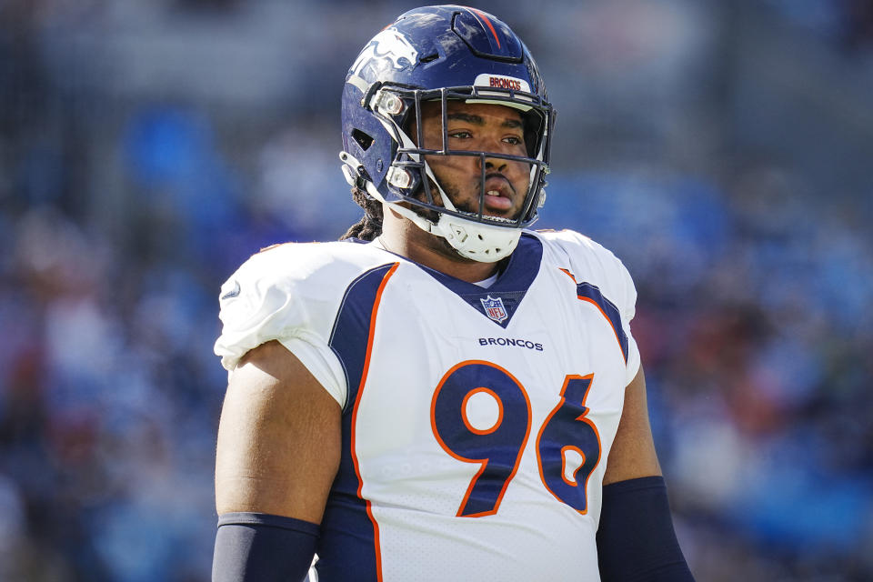 FILE - Denver Broncos defensive end Eyioma Uwazurike looks to the sidelines during an NFL football game against the Carolina Panthers on Nov. 27, 2022, in Charlotte, N.C. Former Iowa State football player Uwazurike was among four athletes accused of gambling on Cyclones sporting events, according to a criminal complaint. Uwazurike was drafted by Denver in 2022 and was suspended indefinitely by the NFL for betting on Broncos games during his rookie season. (AP Photo/Rusty Jones, File)