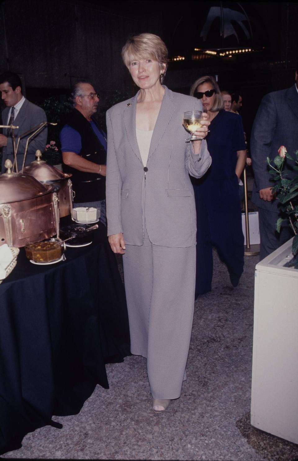 Stewart holding another drink in 1990.