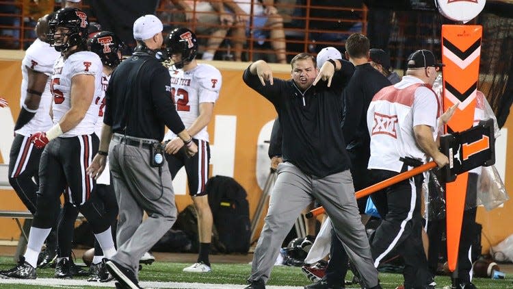 Texas Tech fans aren't the only ones who get overly excited about throwing the Horns Down.