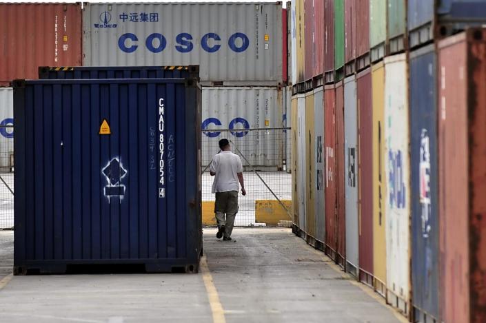China's COSCO firm, through its Piraeus Container Terminal (PCT) arm, manages the two main container terminals at the Greek port of Piraeus -- one of Europe's busiest -- under a 35-year concession signed in 2008 (AFP Photo/Aris Messinis)
