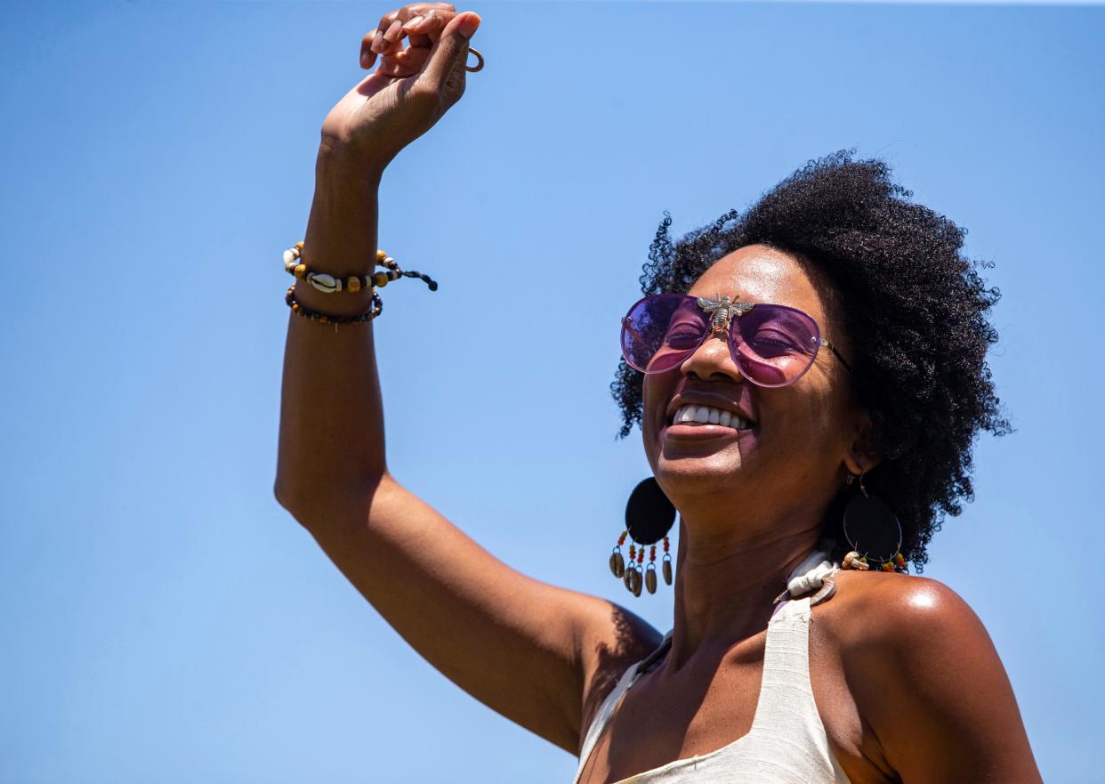 Lori Saunders-Rodgers of Palm Desert dances to music played by DJ John Paul during a Juneteenth celebration at Desert Highland Unity Center in Palm Springs, Calif., Saturday, June 18, 2022. Juneteenth is a federal holiday celebrated on June 19 to commemorate the emancipation of enslaved people in the United States. The holiday was first celebrated in Texas, where on that date in 1865, in the aftermath of the Civil War, slaves were declared free under the terms of the 1862 Emancipation Proclamation.