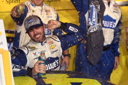 Nov 20, 2016; Homestead, FL, USA; NASCAR Sprint Cup Series driver Jimmie Johnson (48) celebrates after winning the NASCAR Sprint Cup Championship after the Ford Ecoboost 400 at Homestead-Miami Speedway. Mandatory Credit: Jasen Vinlove-USA TODAY Sports