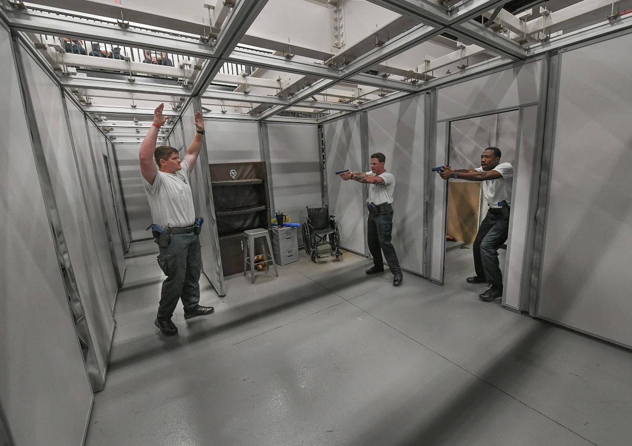 Indian River State College Law Enforcement Basic Recruit Training students James Torini (center) and Jamal Polk (right), both of Port St. Lucie, detain a suspect Tyler McNally, of Palm City , during a training exercise on Thursday, March 7, 2024, at the Treasure Coast Public Safety Training Complex in Fort Pierce.