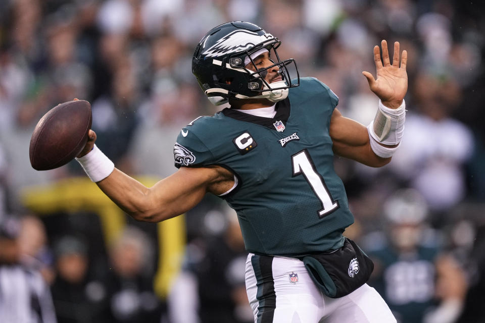 FILE - Philadelphia Eagles quarterback Jalen Hurts passes during the first half of the NFC Championship NFL football game between the Philadelphia Eagles and the San Francisco 49ers on Sunday, Jan. 29, 2023, in Philadelphia. The Chiefs and Eagles are bringing MVP finalists Patrick Mahomes and Jalen Hurts to the Super Bowl to cap a season in which the NFL had a glaring amount of instability at quarterback. (AP Photo/Matt Rourke, File)