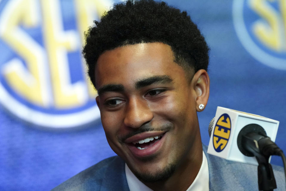 FILE - Alabama quarterback Bryce Young speaks during NCAA college football Southeastern Conference Media Days on Tuesday, July 19, 2022, in Atlanta. Young is a top contender for the 2022 Heisman Trophy. (AP Photo/John Bazemore, File)