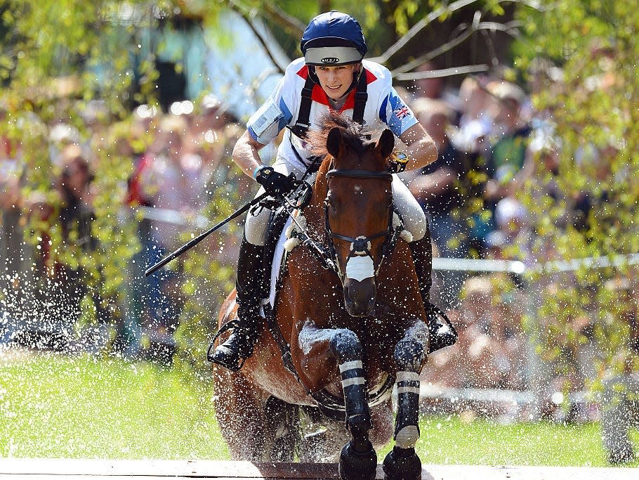 Zara Phillips rides on a horse.