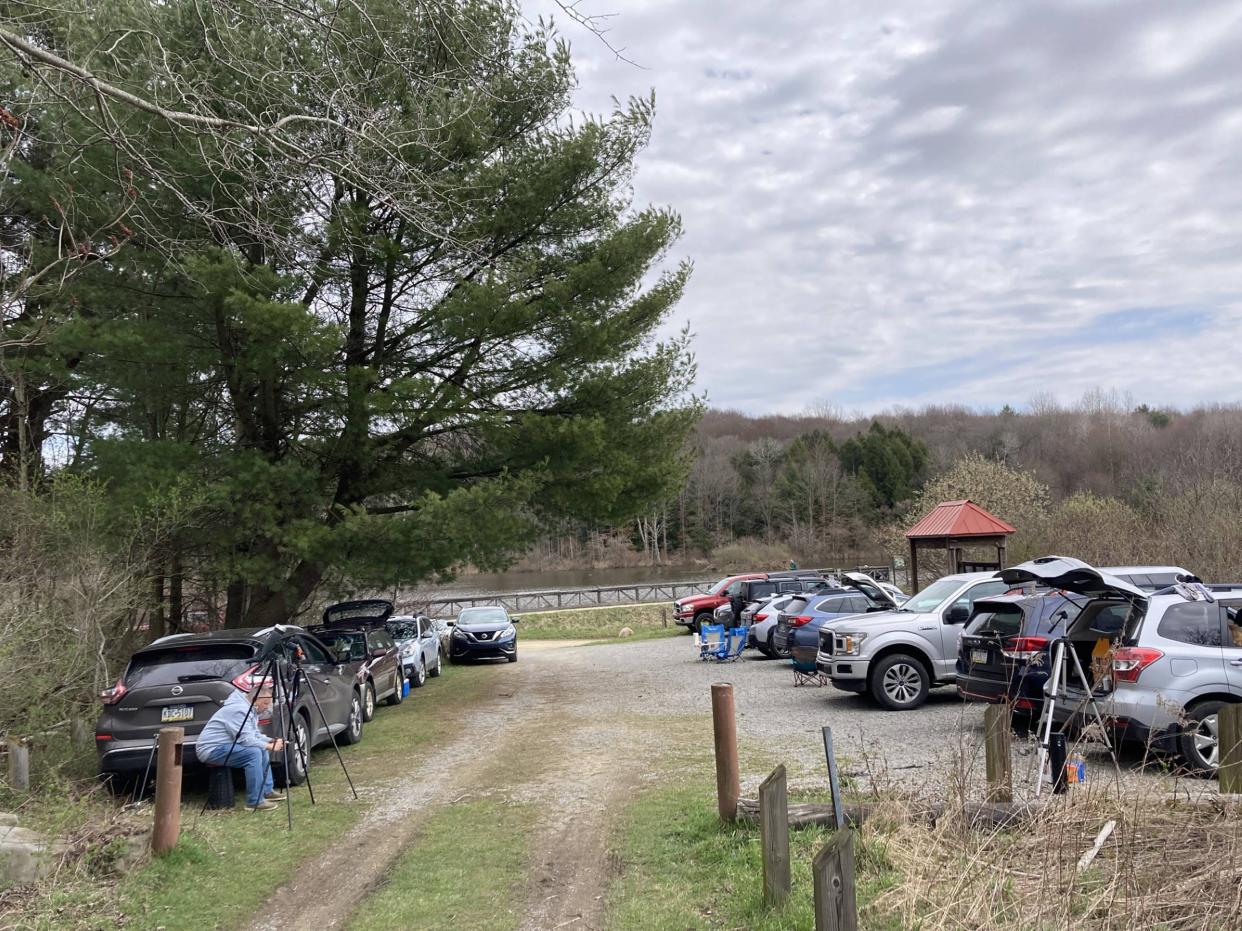 The parking lot at the Deer Run Trail in the Erie National Wildlife Refuge near Cochranton in Crawford County began to fill early the morning of the April 8, 2024, total solar eclipse. The refuge offered a quieter place to view a dazzling display of the eclipse. Vehicles with tags from Virginia, Florida, Wisconsin, Maryland, New York and more were at the site.