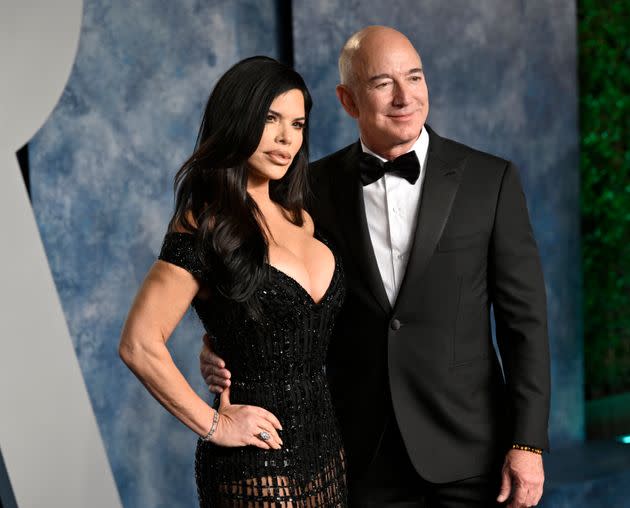 Lauren Sánchez, left, and Jeff Bezos arrive at the Vanity Fair Oscar Party on March 12, 2023, in Beverly Hills. 