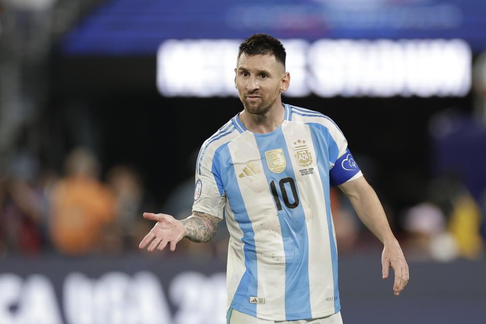 Argentina's Lionel Messi gestures during a Copa America semifinal soccer match against Canada, in East Rutherford, N.J., Tuesday, July 9, 2024. (AP Photo/Adam Hunger)