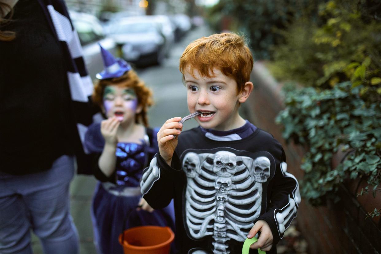 Boy eating Halloween candy