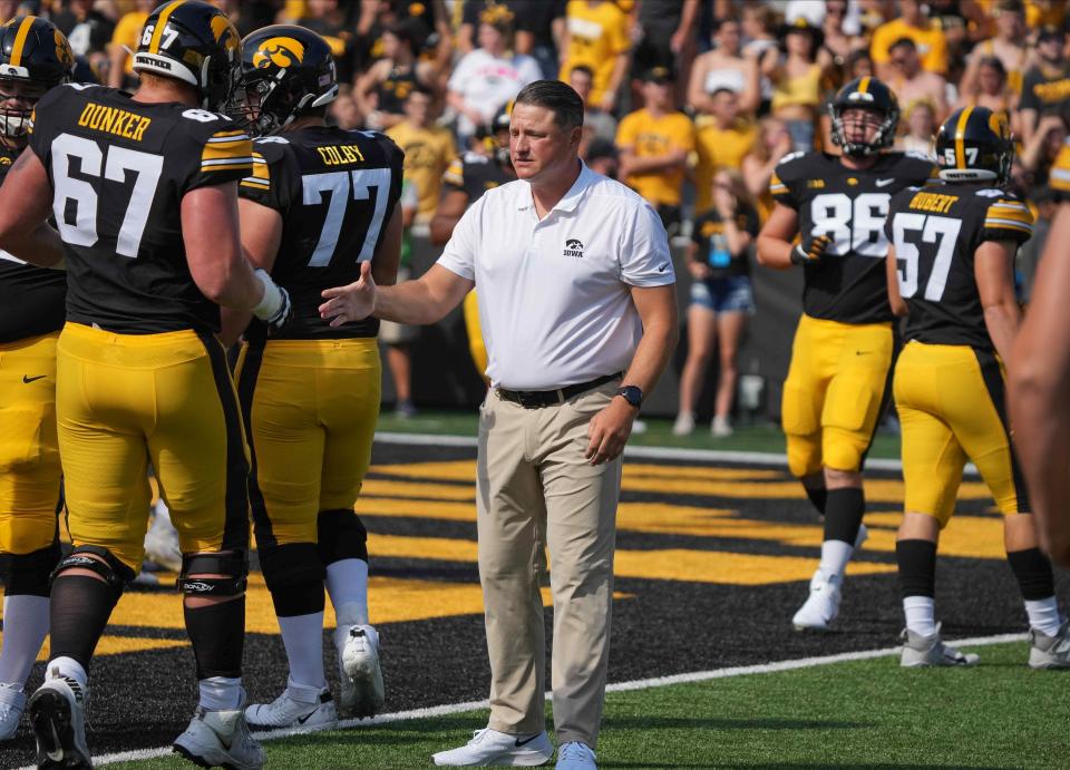 Iowa offensive coordinator Brian Ferentz gets his players ready prior to kickoff against South Dakota State.