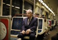 Shareholder activist John Chevedden, 67, rides the subway to the DreamWorks Animation SKG Inc stockholder meeting in Hollywood, California May 29, 2013. For use with special report ACTIVIST-CHEVEDDEN/ REUTERS/Lucy Nicholson