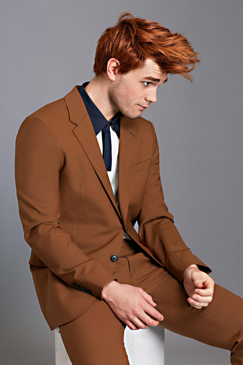 <p>Suit and polo shirt by Theory.</p>