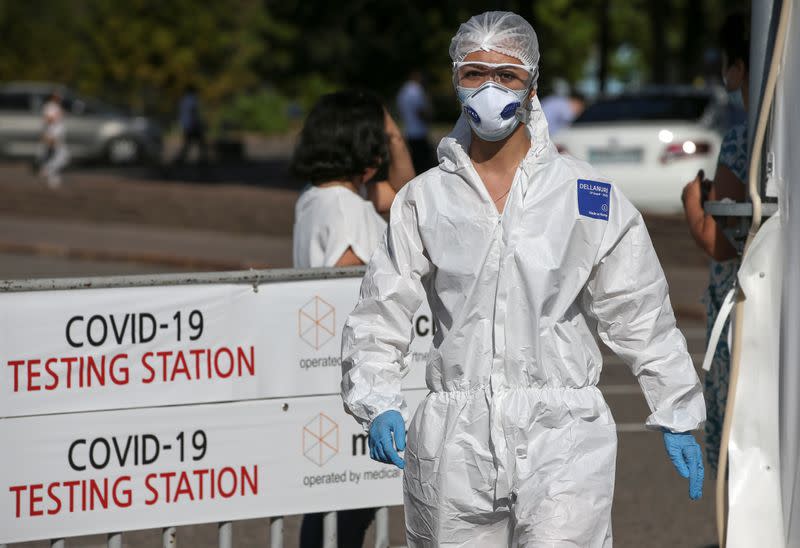 A medical specialist walks at the coronavirus disease testing facility in Almaty