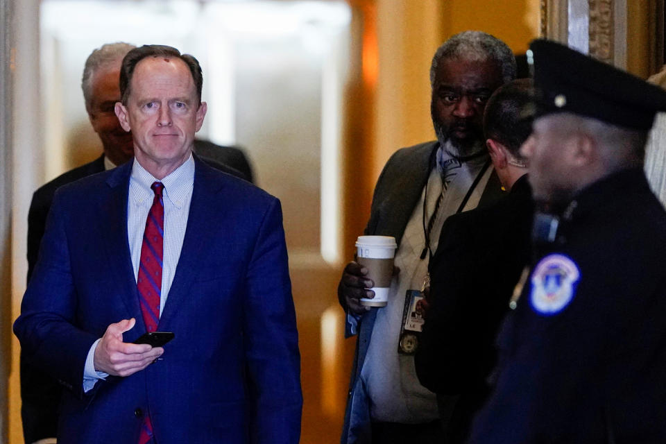 Senator Toomey returns to the Senate Chamber after a break in the impeachment trial of U.S. President Trump in Washington