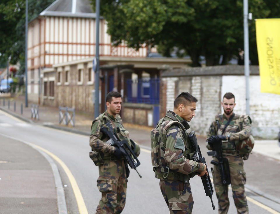 <p>French soldiers stand guard as they prevent the access to the scene of an attack in Saint Etienne du Rouvray, Normandy, France, Tuesday, July 26, 2016. (AP Photo/Francois Mori)</p>
