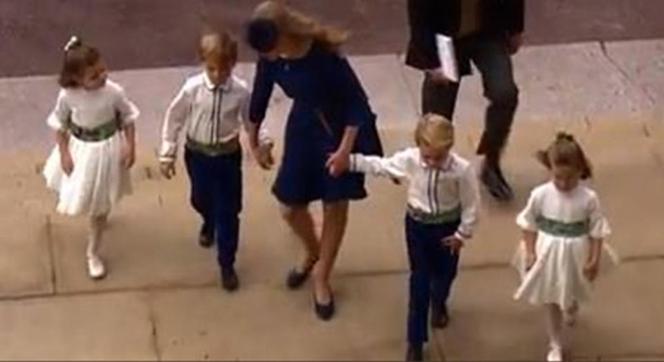 The page boys and flower girls struggled on the steps. [Photo: Twitter]