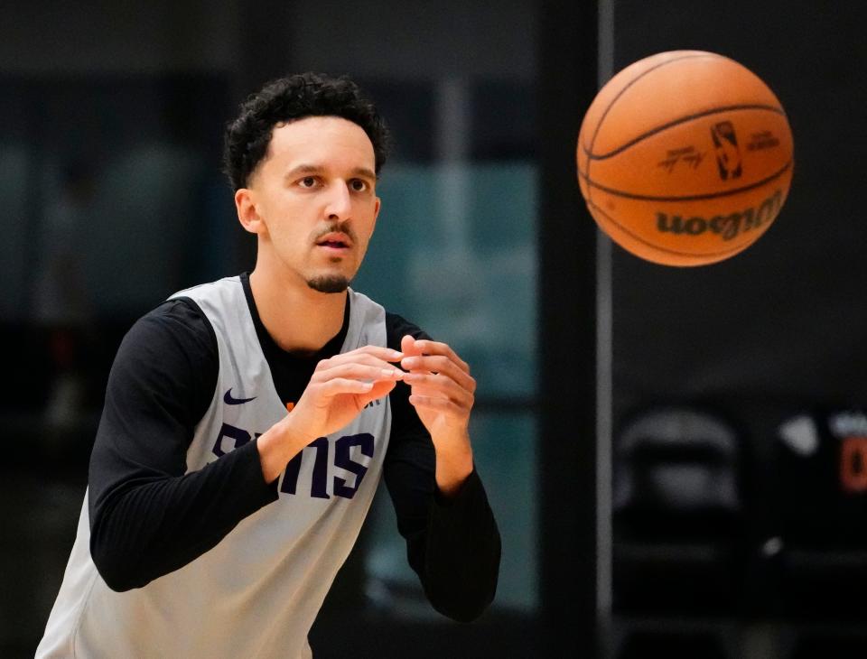 Suns guard Landry Shamet catches a pass during his workout as Phoenix prepares for their first-round playoff match-up against the L.A. Clippers at the Suns Training Facility in Phoenix on April 12, 2023.