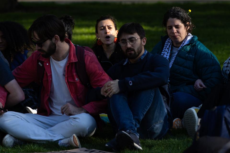 University of Notre Dame student Arrows, third from right, leads a chant in a pro-Palestinian protest on Notre Dame's campus on Thursday, April 25, 2024.