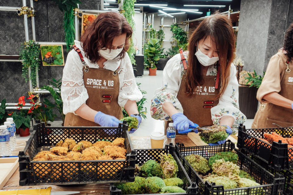 Participants trying their hand at a moss frame installation workshop. (PHOTO: Space 4 Us)