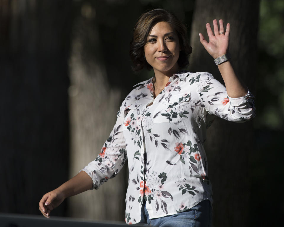 FILE - In this June 28, file 2018 photo, Democratic gubernatorial candidate Paulette Jordan waves to the crowd before speaking during the Idaho District 18 Democrats Campaign Kickoff BBQ in Boise, Idaho. If she pulls the upset against Lt. Gov. Brad Little in November 2018, the member of the Coeur d'Alene Tribe will be the first Native American governor of a U.S. state. More than 100 Native Americans are seeking seats in Congress, governor's offices, state legislatures and other posts across the country in what political observers say has been a record number of candidates. (AP Photo/Otto Kitsinger, File)