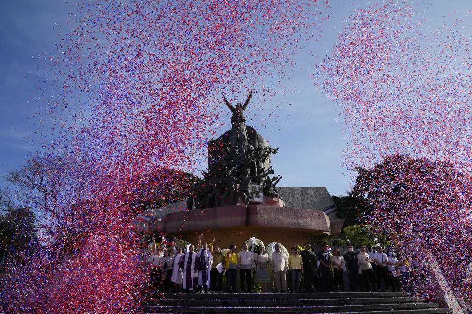Confetti fall during ceremonies marking the 37th anniversary of the near-bloodless coup popularly known as "People Power" revolution that ousted the late Philippine dictator Ferdinand Marcos from 20-year-rule at the People's Power Monument in Quezon city, Philippines on Saturday Feb. 25, 2023. It is the first year marking the event under the rule of Marcos Jr. (AP Photo/Aaron Favila)