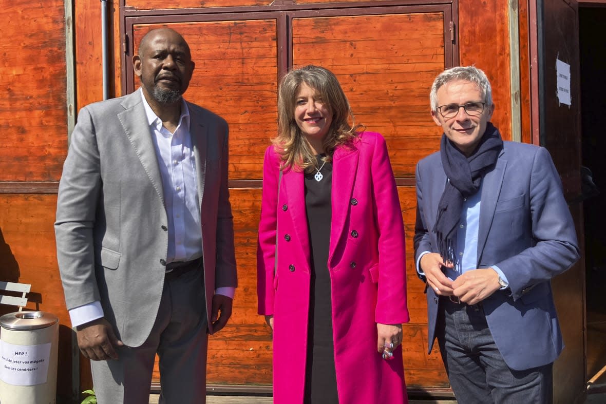 Actor Forest Whitaker, left, Aubervilliers mayor Karine Franclet, center, and Stephane Troussel, head of the Seine Saint-Denis region, pose Wednesday, May 17, 2023 in Paris suburb Aubervilliers. (AP Photo/Oleg Cetinic)