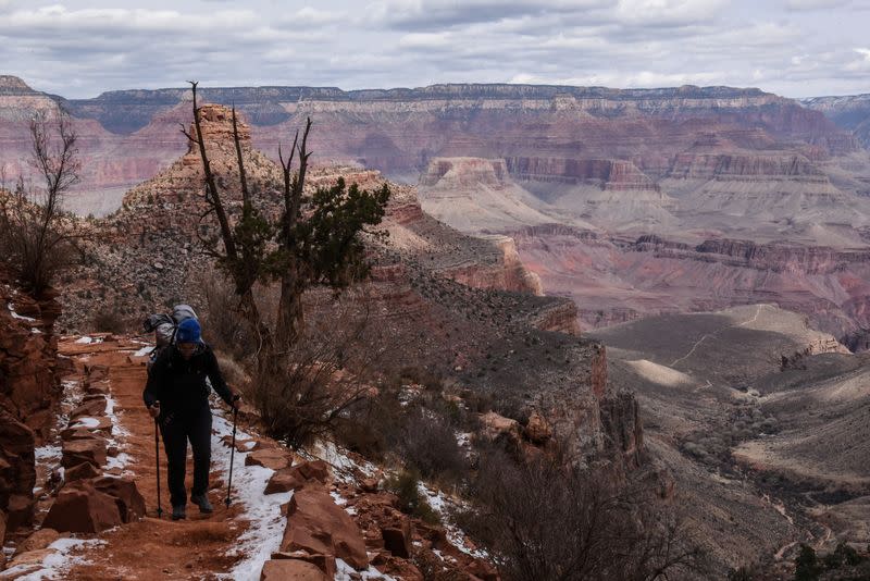 FILE PHOTO: A person hikes on the Bright Angel Trail in the Grand Canyon near Grand Canyon Village