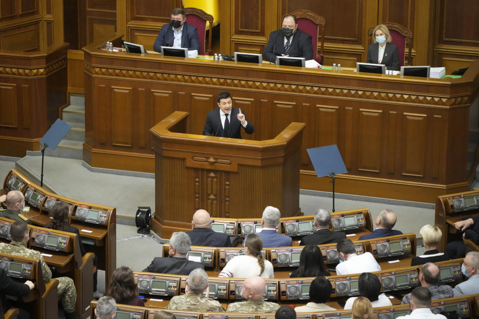 Ukrainian President Volodymyr Zelenskyy addresses lawmakers in Kyiv, Ukraine, Wednesday, Dec.1, 2021. Ukraine marks the 30th anniversary of the referendum on independence. (AP Photo/Efrem Lukatsky)