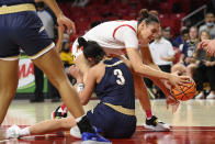 Maryland forward Mimi Collins, top, competes for the ball against Mount St. Mary's guard Kendall Bresee (3) during the first half of an NCAA college basketball game Tuesday, Nov. 16, 2021, in College Park, Md. (AP Photo/Nick Wass)