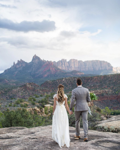 Love that this groom matched his suit to the gray rocks of Zion National Park. 