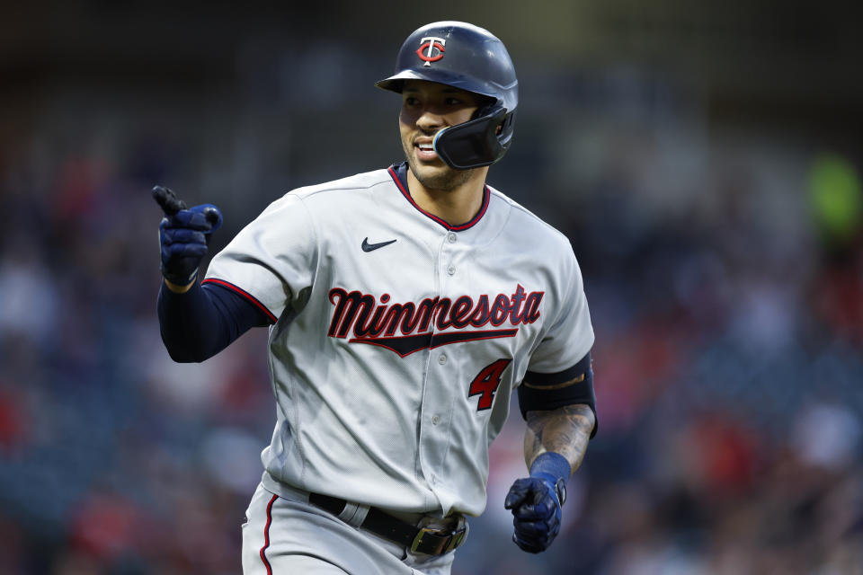 Minnesota Twins' Carlos Correa rounds the bases after hitting a two-run home run against the Cleveland Guardians during the seventh inning of a baseball game Monday, June 27, 2022, in Cleveland. (AP Photo/Ron Schwane)