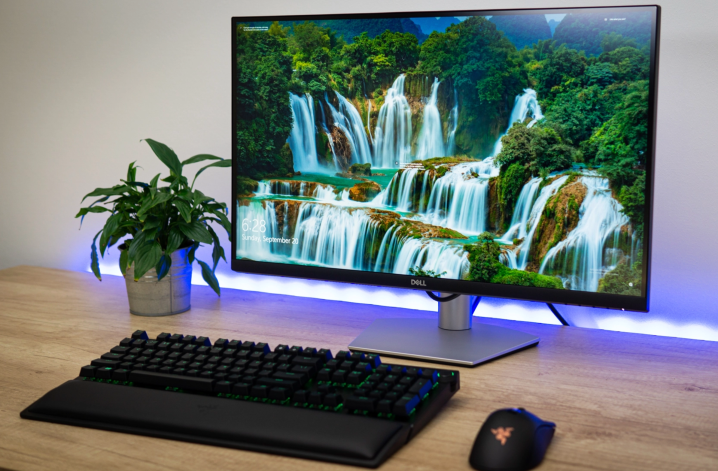 The 27-inch Dell S2721QS 4K monitor on a table.