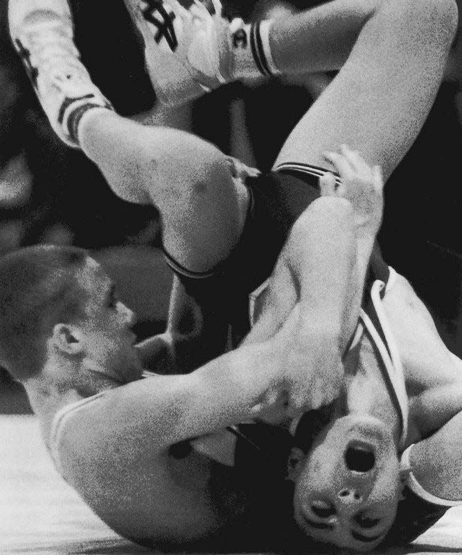 1995: Ogden's Jason Keenan, left, in 1995 became the 10th wrestler to win a fourth Iowa high school state title.