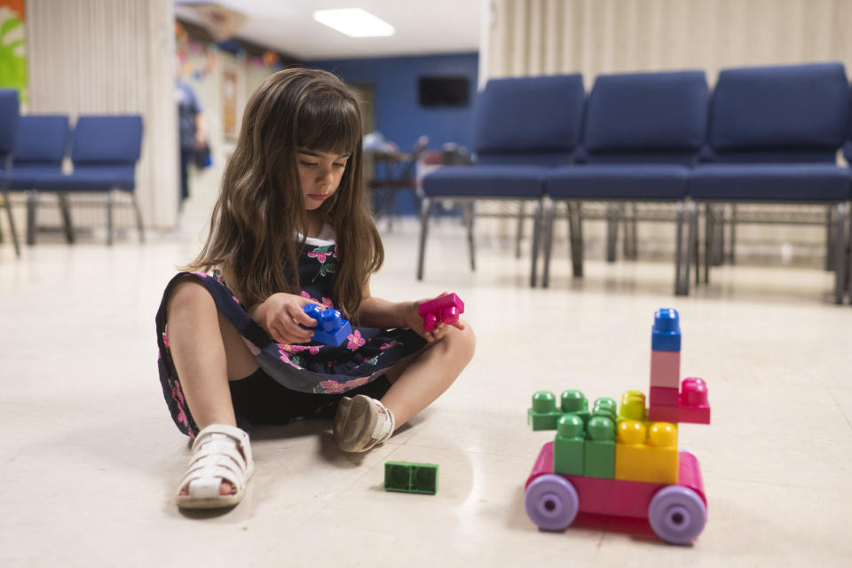 Madison Schroeder plays with blocks at the kid’s church at the Bethel Assembly of God in Grand Junction, Colo. (Kelsey Brunner for The Washington Post)