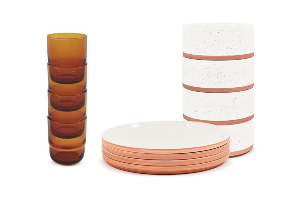 White and pink and orange plates, bowls, and glasses