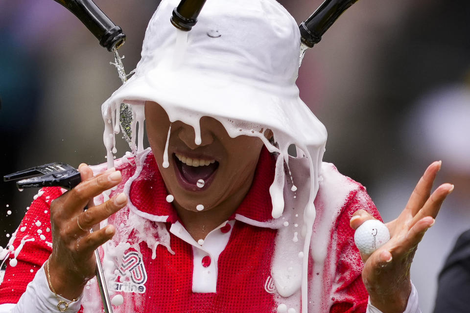 Amy Yang, of South Korea, is doused after winning the Women's PGA Championship golf tournament at Sahalee Country Club, Sunday, June 23, 2024, in Sammamish, Wash. (AP Photo/Lindsey Wasson)