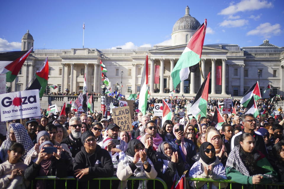 People take part in ''Stop the Genocide in Gaza'' national demonstration in Trafalgar Square, central London, Saturday March 30, 2024. (Victoria Jones/PA via AP)