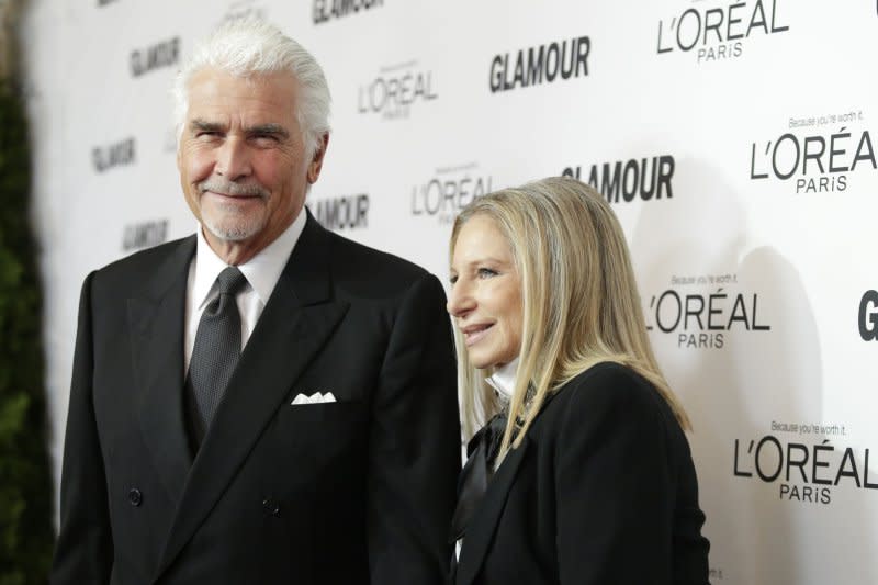 Barbra Streisand (R) and James Brolin attend the Glamour Women of the Year Awards in 2013. File Photo by John Angelillo/UPI