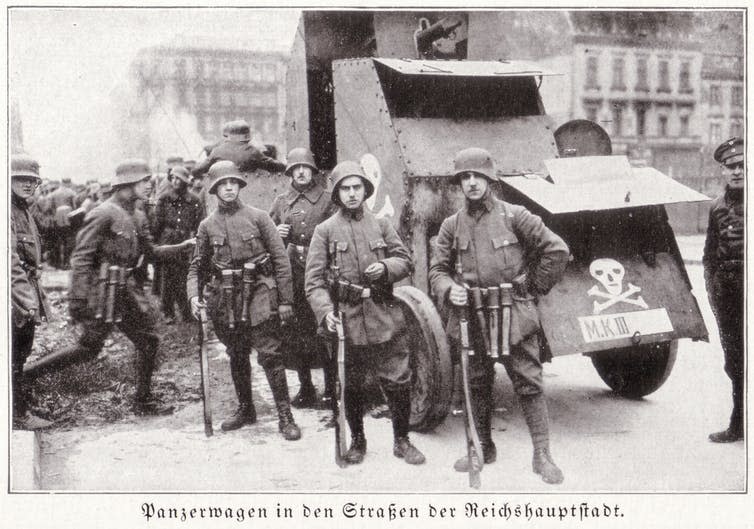 <span class="caption">The paramilitary Freikorps quashed revolution in post-WWI Germany and were responsible for Luxemburg’s murder.</span> <span class="attribution"><a class="link " href="https://en.wikipedia.org/wiki/Freikorps#/media/File:FreikorpsBerlinStahlhelmM18TuerkischeForm.jpg" rel="nofollow noopener" target="_blank" data-ylk="slk:Henrich/WikimediaCommons;elm:context_link;itc:0;sec:content-canvas">Henrich/WikimediaCommons</a></span>