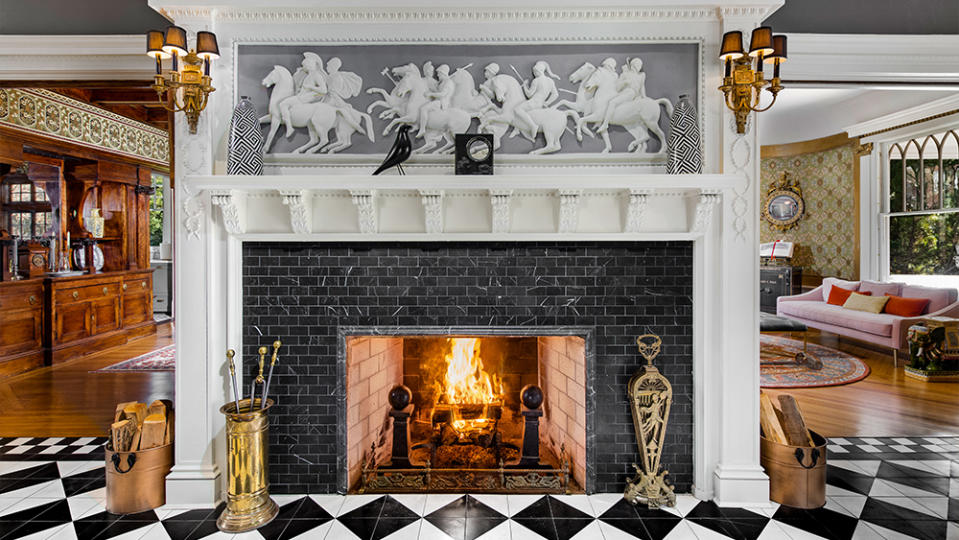 One of the home’s eight total fireplaces.