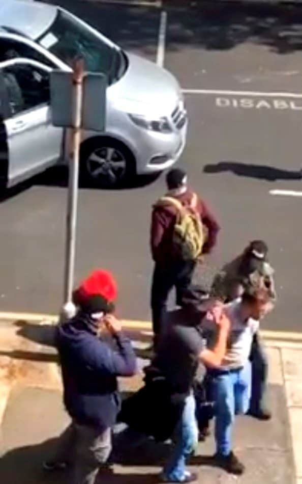 The man, believed to be in his 20s, was tackled after an afternoon of terror in the town centre - Credit: Wigan Today / SWNS.com