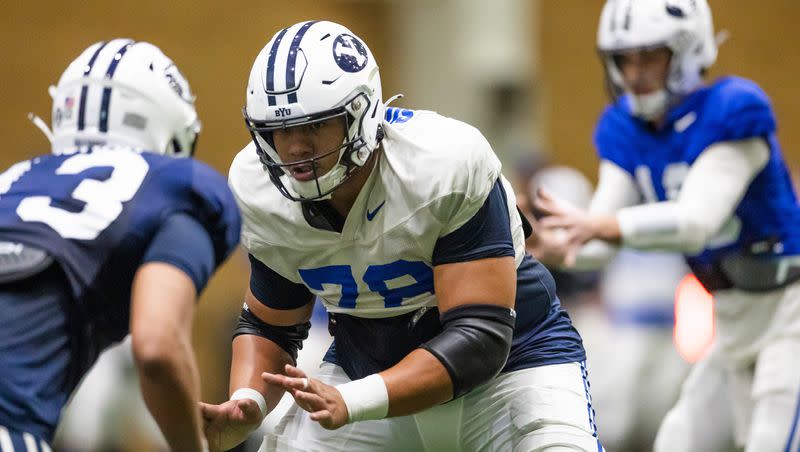 BYU offensive lineman Kingsley Suamataia prepares to pass block during spring practice at the indoor practice facility in Provo on March 10, 2023. If Suamataia declares for the draft next season, he’s expected to be an early-round pick in the 2024 NFL draft.