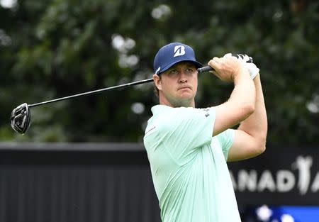 Jul 27, 2017; Oakville, Ontario, CAN; Hudson Swafford hits his tee shot from the tenth tee during the first round of the RBC Canadian Open golf tournament at Glen Abbey Golf Club. Mandatory Credit: Eric Bolte-USA TODAY Sports