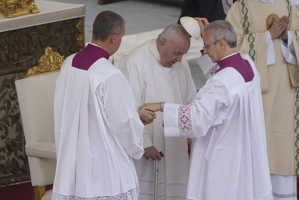 Pope Francis leaves at he end of a mass he celebrated for the canonization of two new saints, Giovanni Battista Scalabrini and Artemide Zatti, in St. Peter's Square at the Vatican, Sunday, Oct. 9, 2022. (AP Photo/Gregorio Borgia)