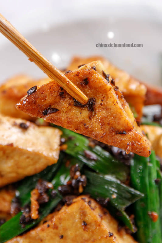 <p><strong>Get the recipe here: <a href="https://www.chinasichuanfood.com/pan-fried-tofu-with-black-bean-sauce/" rel="nofollow noopener" target="_blank" data-ylk="slk:Pan-fried Tofu with Black Bean Sauce;elm:context_link;itc:0;sec:content-canvas" class="link ">Pan-fried Tofu with Black Bean Sauce</a></strong></p>